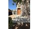 Beautiful home featuring stone accents, wooden door and manicured landscaping at 1146 Olivia Pkwy, Henderson, NV 89011
