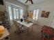 Bright home office with large windows, shutters, and a comfortable workspace for productivity at 1146 Olivia Pkwy, Henderson, NV 89011