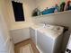Well-equipped laundry room with shelving and counter space at 1146 Olivia Pkwy, Henderson, NV 89011