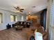 Open living space with dining table, comfortable seating, and lots of natural light at 1146 Olivia Pkwy, Henderson, NV 89011