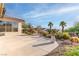 Large backyard patio space with landscaped yard, lots of sunshine and beautiful desert plants at 1239 N Hollywood Blvd, Las Vegas, NV 89110