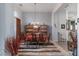 Elegant dining room with a chandelier, stylish decor, and comfortable seating for formal or casual meals at 1239 N Hollywood Blvd, Las Vegas, NV 89110
