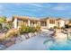 Exterior showcases the backyard pool and spa, and a covered patio and outdoor living space at 1239 N Hollywood Blvd, Las Vegas, NV 89110