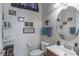 Charming half-bathroom with decorative accents, a stylish mirror, and well-maintained fixtures at 1239 N Hollywood Blvd, Las Vegas, NV 89110