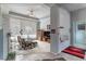 Comfortable living room with ample natural light, cozy seating and a entertainment center, perfect for relaxation at 1239 N Hollywood Blvd, Las Vegas, NV 89110