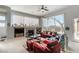 Relaxing living room featuring a fireplace, comfortable seating, and serene outdoor views at 1239 N Hollywood Blvd, Las Vegas, NV 89110