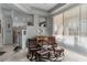 Open floor plan showcasing the living room's inviting layout with leather seating and decor at 1239 N Hollywood Blvd, Las Vegas, NV 89110