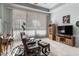 Comfortable living room with modern furnishings and natural light from the large window at 1239 N Hollywood Blvd, Las Vegas, NV 89110