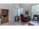 Office space includes a desk, shelving unit, and closet, providing ample storage and workspace at 1239 N Hollywood Blvd, Las Vegas, NV 89110