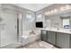 Elegant bathroom with double vanity, large soaking tub, and glass shower at 15 Santo Mio Ct, Henderson, NV 89011