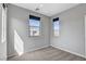 Sunlit room features two windows and neutral-toned walls and carpet at 15 Santo Mio Ct, Henderson, NV 89011
