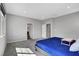 Bright, spacious bedroom with carpet and multiple doorways that lead to the bathroom and other rooms in the home at 15 Santo Mio Ct, Henderson, NV 89011