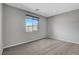 A bright bedroom featuring a large window with neighborhood views at 15 Santo Mio Ct, Henderson, NV 89011