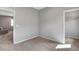 Cozy bedroom with soft carpet flooring and access to an open closet at 15 Santo Mio Ct, Henderson, NV 89011