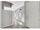 Light and airy hallway with white walls and tile floors leads to other areas of the home at 15 Santo Mio Ct, Henderson, NV 89011