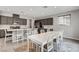 Kitchen featuring modern appliances, island, and dining table at 15 Santo Mio Ct, Henderson, NV 89011
