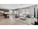 Open-concept living room seamlessly connects to kitchen and dining at 15 Santo Mio Ct, Henderson, NV 89011
