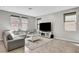 Stylish living room with comfortable seating and modern entertainment center at 15 Santo Mio Ct, Henderson, NV 89011