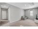 Bright living area featuring a sofa, TV, and desk with chairs at 15 Santo Mio Ct, Henderson, NV 89011
