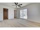 Open bedroom space with light wood-look floors and lots of natural light at 1641 K St, Las Vegas, NV 89106
