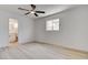 Airy bedroom featuring light wood-look floors, and a ceiling fan at 1641 K St, Las Vegas, NV 89106