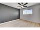 Bedroom with a large window and light wood flooring at 1641 K St, Las Vegas, NV 89106