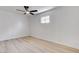 Bedroom with a window and light wood flooring at 1641 K St, Las Vegas, NV 89106