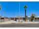 Cozy single-story home with a desert landscape, block wall, and gated entrance at 1641 K St, Las Vegas, NV 89106