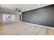 Spacious living room with neutral walls, recessed lighting and modern light wood flooring at 1641 K St, Las Vegas, NV 89106