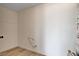 Bare room with closet, laminate floors, and unfinished elements at 1641 K St, Las Vegas, NV 89106