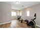 A bonus room with exercise equipment and hardwood flooring at 176 Dunblane St, Henderson, NV 89012