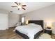 Comfortable main bedroom with an ensuite bath, a ceiling fan, and neutral walls at 176 Dunblane St, Henderson, NV 89012