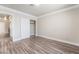 This bedroom features wood-look floors and a closet with sliding doors at 1804 Michael Ct, Henderson, NV 89014