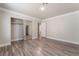 This bedroom features wood-look floors and a mirrored closet with sliding doors at 1804 Michael Ct, Henderson, NV 89014