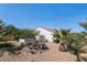 Well-maintained backyard with desert landscaping and an in-ground spa, perfect for enjoying the outdoors at 2188 Cumberland Hill Dr, Henderson, NV 89052