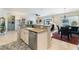Gourmet kitchen with a breakfast bar, stainless steel dishwasher, and an open layout at 2188 Cumberland Hill Dr, Henderson, NV 89052