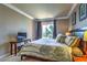 Serene bedroom with a queen bed, access to the balcony, and a cozy atmosphere at 220 E Flamingo Rd # 317, Las Vegas, NV 89169
