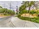 Street view of The Meridian with landscaping and the community sign at 220 E Flamingo Rd # 317, Las Vegas, NV 89169