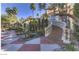 Beautiful property entrance with a grand staircase, lush landscaping, and a welcoming atmosphere at 220 E Flamingo Rd # 317, Las Vegas, NV 89169