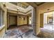 Outdoor walkway of complex with earth tone pavers and pillars and multiple entry ways at 220 E Flamingo Rd # 317, Las Vegas, NV 89169