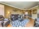 Open-concept living room with stylish decor, a dining area, and hardwood flooring at 220 E Flamingo Rd # 317, Las Vegas, NV 89169