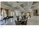 Spacious lounge featuring a grand piano, ample seating, and plenty of natural light at 220 E Flamingo Rd # 317, Las Vegas, NV 89169