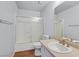 Bathroom features a tub shower combo, white toilet and vanity with a sink at 2558 La Fortuna Ave, Las Vegas, NV 89121