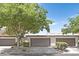 Charming single-story home with mature landscaping, a two-car garage, and a welcoming facade at 2558 La Fortuna Ave, Las Vegas, NV 89121