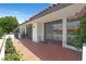 Charming tiled patio with lush landscaping, offering a private outdoor retreat at 2558 La Fortuna Ave, Las Vegas, NV 89121