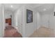 Bright hallway with neutral tones, connecting the living spaces with bedroom and bathroom access at 270 E Flamingo Rd # 106, Las Vegas, NV 89169