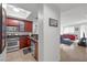 Well-appointed kitchen with wood cabinets, granite countertops, stainless steel appliances, and tiled floors at 270 E Flamingo Rd # 106, Las Vegas, NV 89169