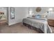 Comfortable main bedroom with soft colors, large mirror, and natural light, creating a relaxed ambiance at 270 E Flamingo Rd # 106, Las Vegas, NV 89169