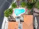 Aerial view of the home showcasing the backyard swimming pool and mature landscaping at 3135 La Mesa Dr, Henderson, NV 89014