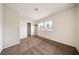 Neutral bedroom featuring plush carpeting, bright windows, and closet space at 3135 La Mesa Dr, Henderson, NV 89014